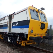 A Matisa tamper tamping on the railway tracks