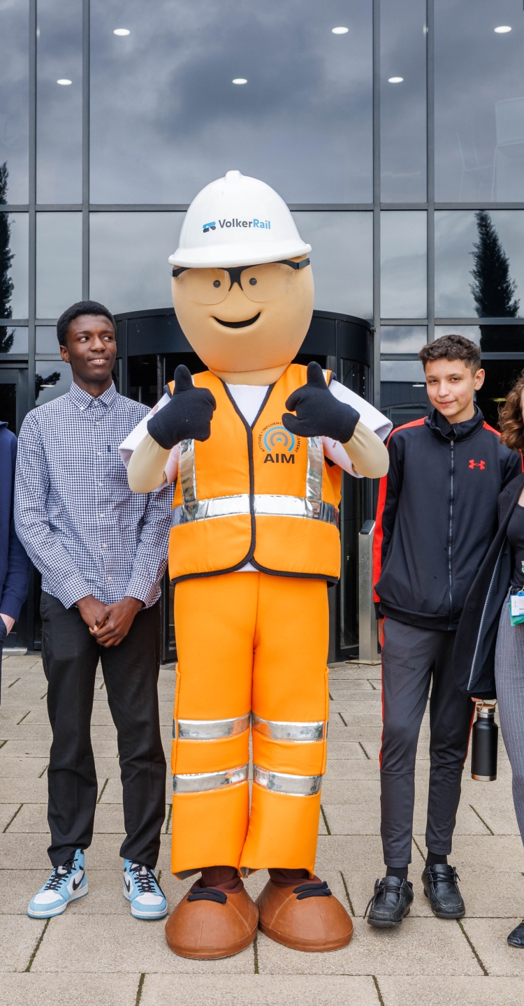 A group of students with a mascot