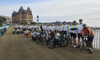 group of cyclists posing for a picture