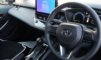 inside of a car showing the steering wheel