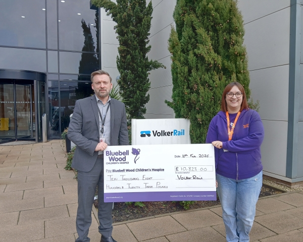 Cheque handover to Bluebell wood outside of VolkerRail's office